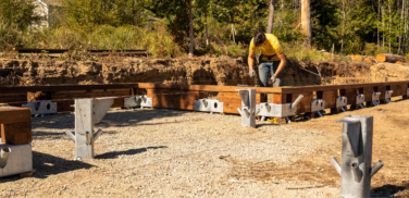 Image of a Ground Frame worker on an active construction site.